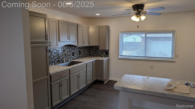 11657 Engleman Rd, Warren, MI 48089 - kitchen with a sink, gray cabinetry, a ceiling fan, decorative backsplash, and recessed lighting
