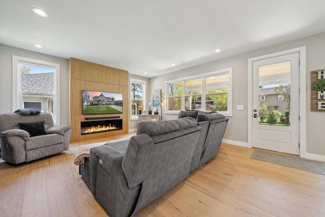 1663 Fairway Dr, Birmingham, MI 48009 - living area with light wood-type flooring, a fireplace, baseboards, and recessed lighting