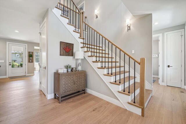 1663 Fairway Dr, Birmingham, MI 48009 - stairway featuring wood finished floors, baseboards, and recessed lighting