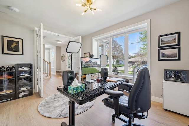 1663 Fairway Dr, Birmingham, MI 48009 - office area with light wood-type flooring, a chandelier, and baseboards