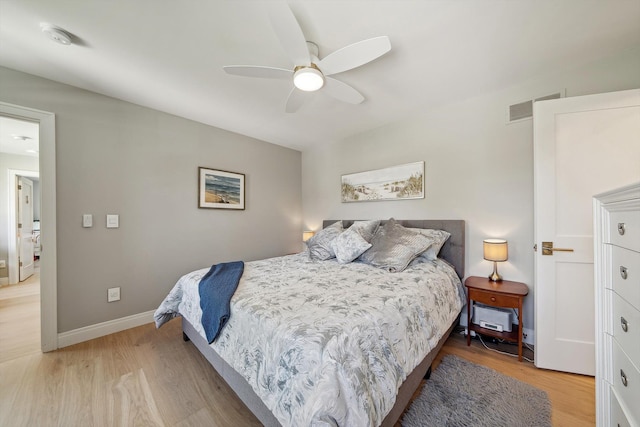 1663 Fairway Dr, Birmingham, MI 48009 - bedroom with wood finished floors, ceiling fan, and baseboards