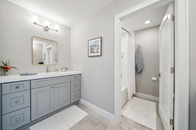 1663 Fairway Dr, Birmingham, MI 48009 - bathroom with vanity, shower / bath combo with shower curtain, and baseboards