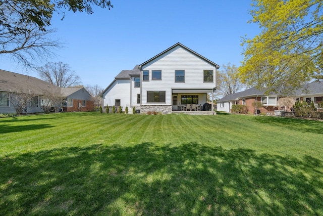 1663 Fairway Dr, Birmingham, MI 48009 - back of house featuring a yard and stone siding