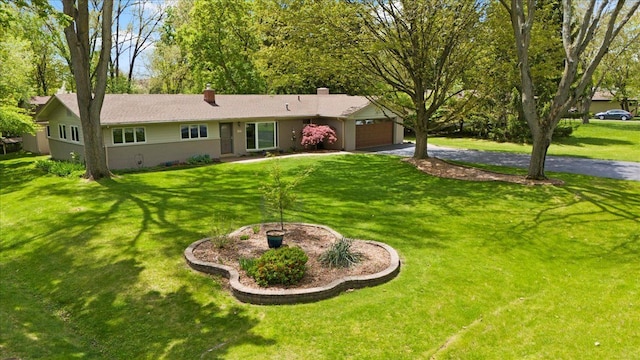 1831 Ansal Dr, Rochester Hills, MI 48309 - ranch-style house with an attached garage, asphalt driveway, a front yard, and a chimney