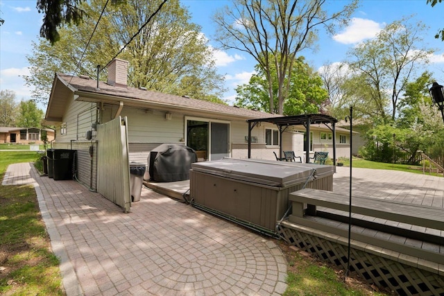 1831 Ansal Dr, Rochester Hills, MI 48309 - back of property featuring a hot tub, a wooden deck, a chimney, a patio area, and a pergola