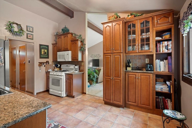 1831 Ansal Dr, Rochester Hills, MI 48309 - kitchen with white appliances, backsplash, brown cabinetry, glass insert cabinets, and light stone countertops