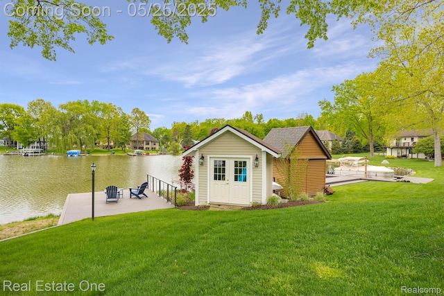 3882 Lake Lapeer Dr, Metamora, MI 48455 - dock area with a water view, a yard, and a patio area