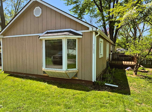 3188 Bessie St, Auburn Hills, MI 48326 - view of home's exterior featuring a wooden deck and a yard