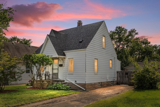 19319 Centralia, Redford, MI 48240 - view of front facade featuring a shingled roof and a chimney
