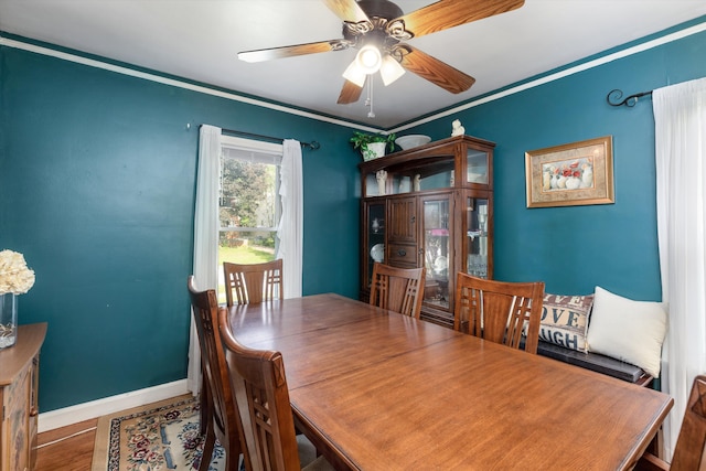 19319 Centralia, Redford, MI 48240 - dining room featuring baseboards, crown molding, ceiling fan, and wood finished floors