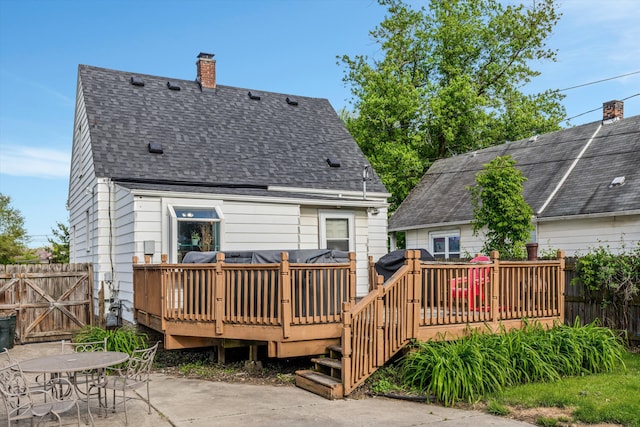 19319 Centralia, Redford, MI 48240 - rear view of property with a wooden deck, roof with shingles, a chimney, a patio area, and a gate