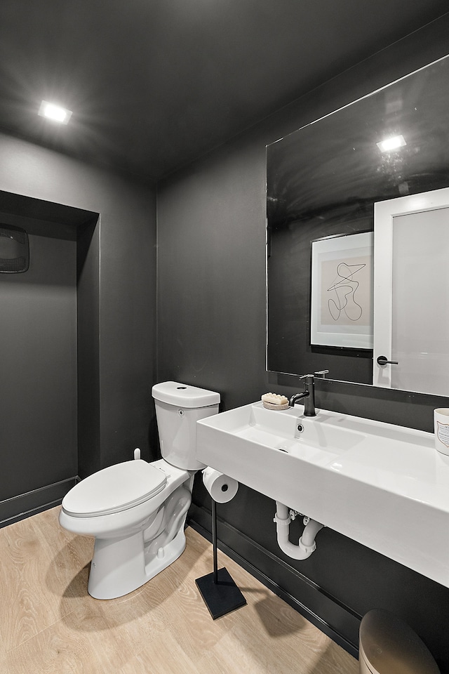 533 E Harrison Ave Unit 20, Royal Oak, MI 48067 - half bath with toilet and wood finished floors