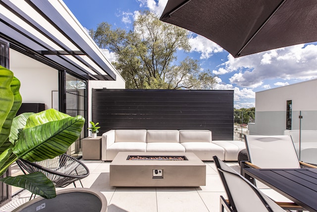 533 E Harrison Ave Unit 20, Royal Oak, MI 48067 - view of patio featuring an outdoor living space with a fire pit, outdoor dining space, and fence