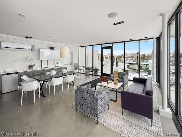 533 E Harrison Ave Unit 20, Royal Oak, MI 48067 - living area featuring a wall mounted air conditioner, healthy amount of natural light, french doors, and expansive windows