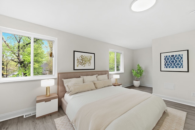 27733 Kaufman St, Roseville, MI 48066 - bedroom featuring baseboards and wood finished floors