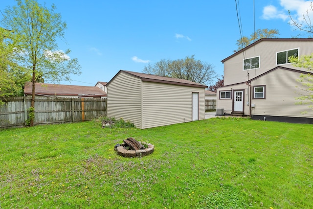 27733 Kaufman St, Roseville, MI 48066 - view of yard featuring entry steps, an outdoor structure, and central AC unit