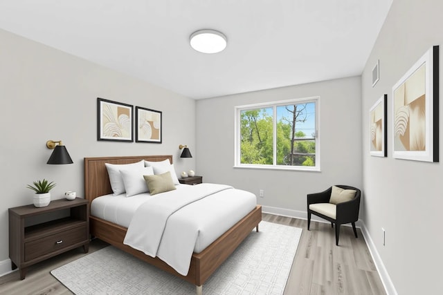 27733 Kaufman St, Roseville, MI 48066 - bedroom with light wood-type flooring and baseboards