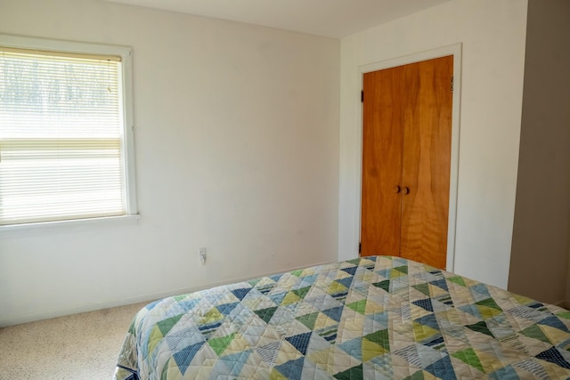 7198 Farr Rd, Onekama, MI 49675 - bedroom featuring baseboards and carpet