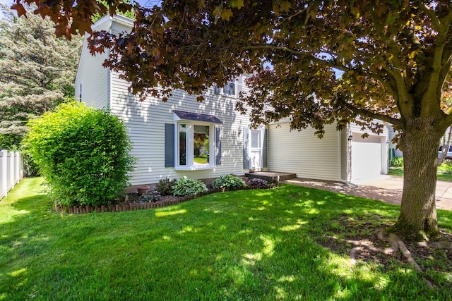 41944 Cherry Hill Rd, Novi, MI 48375 - view of property hidden behind natural elements with concrete driveway and an attached garage