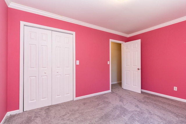41944 Cherry Hill Rd, Novi, MI 48375 - unfurnished bedroom featuring ornamental molding, carpet, a closet, and baseboards