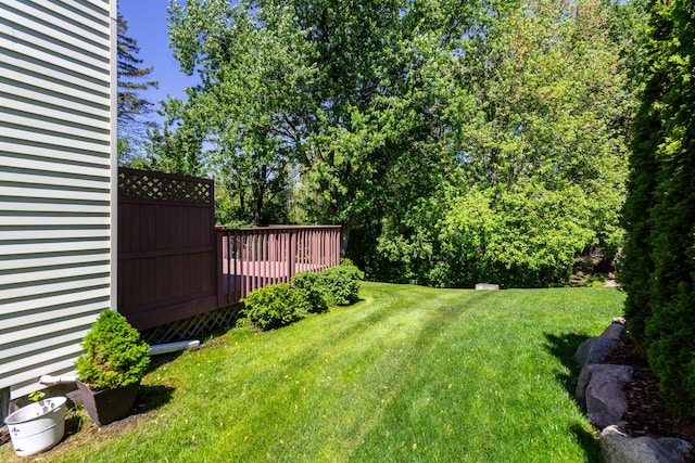 41944 Cherry Hill Rd, Novi, MI 48375 - view of green lawn with a wooden deck