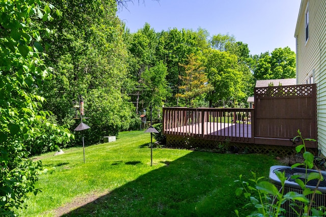 41944 Cherry Hill Rd, Novi, MI 48375 - view of grassy yard featuring a wooden deck and cooling unit