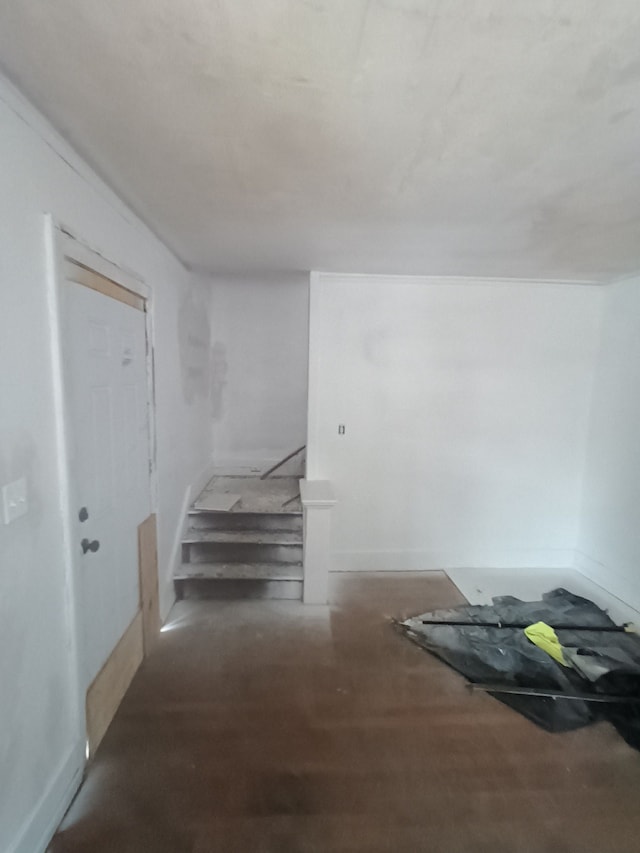 9591 American St, Detroit, MI 48204 - stairway featuring wood finished floors and baseboards