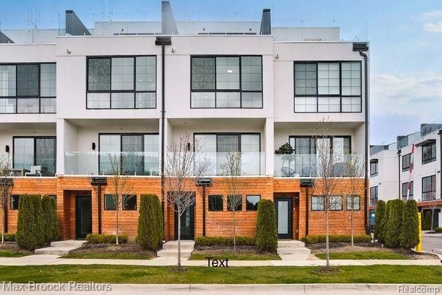 533 E Harrison Ave Unit 23, Royal Oak, MI 48067 - view of front of property with stucco siding