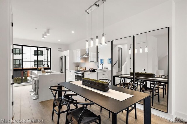 533 E Harrison Ave Unit 23, Royal Oak, MI 48067 - dining space with light wood finished floors and recessed lighting