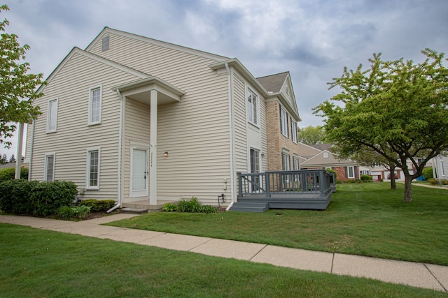 37374 Stonegate Cir, Clinton Township, MI 48036 - view of front facade featuring a deck and a front lawn