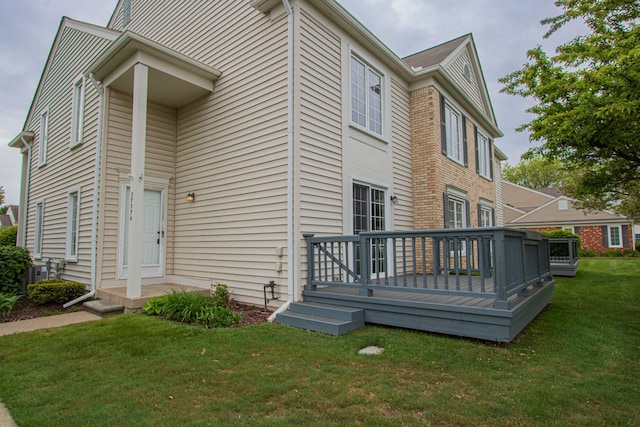 37374 Stonegate Cir, Clinton Township, MI 48036 - back of house with a wooden deck and a yard