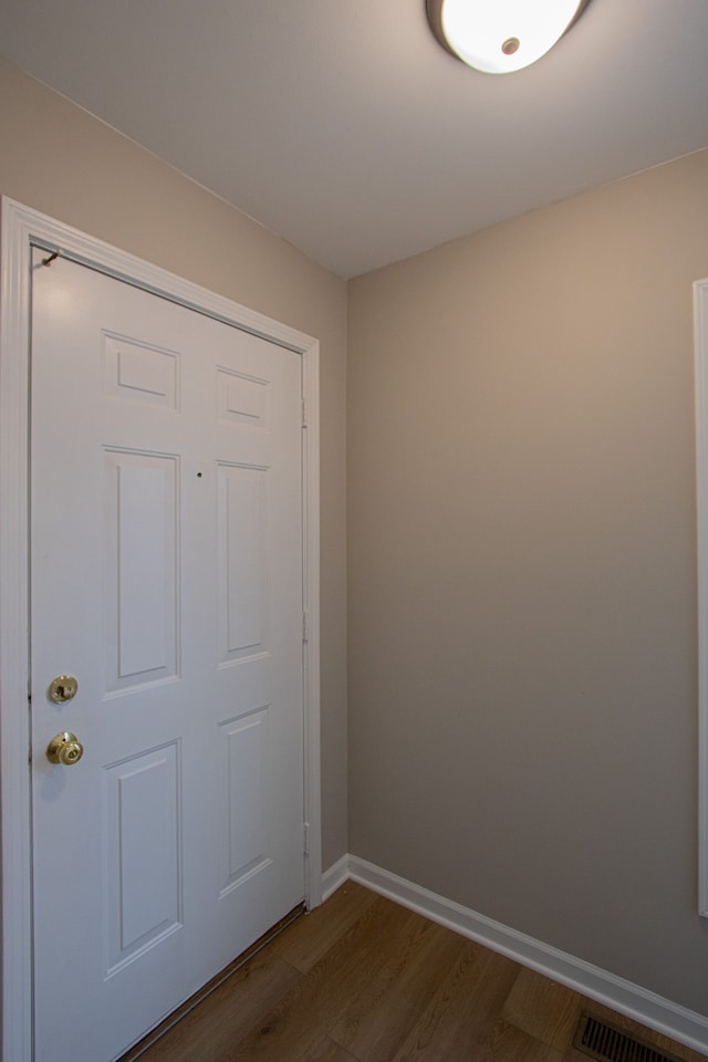 37374 Stonegate Cir, Clinton Township, MI 48036 - entryway featuring dark wood-style flooring and baseboards