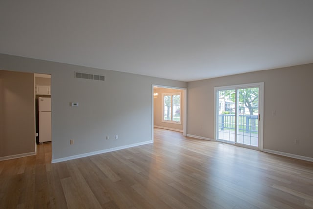 37374 Stonegate Cir, Clinton Township, MI 48036 - empty room with light wood finished floors and baseboards