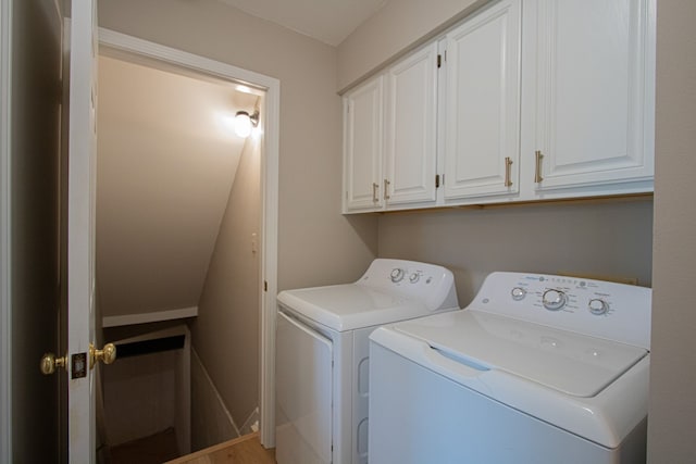 37374 Stonegate Cir, Clinton Township, MI 48036 - laundry area featuring separate washer and dryer and cabinet space
