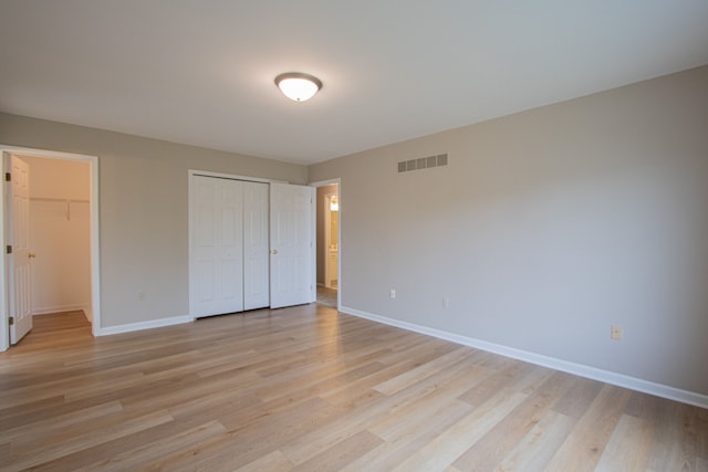 37374 Stonegate Cir, Clinton Township, MI 48036 - unfurnished bedroom featuring baseboards and light wood-type flooring