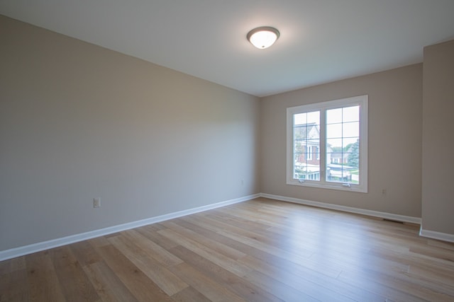 37374 Stonegate Cir, Clinton Township, MI 48036 - spare room featuring light wood finished floors and baseboards