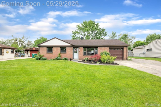 2514 Hearthside Dr, Ypsilanti, MI 48198 - view of front facade with driveway, brick siding, an attached garage, and a front yard