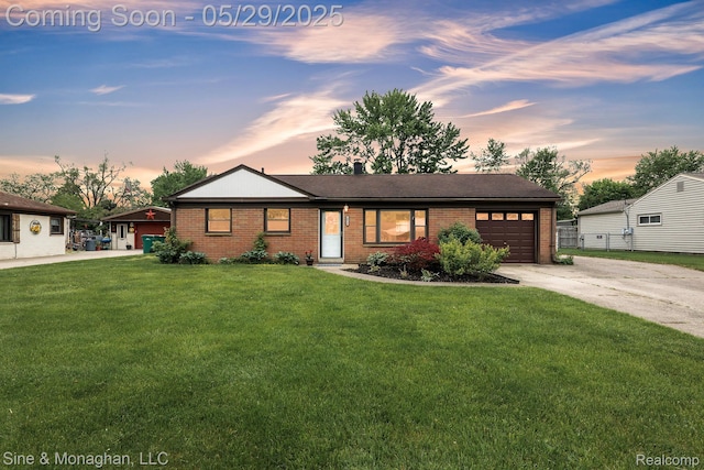 2514 Hearthside Dr, Ypsilanti, MI 48198 - view of front of house featuring a garage, driveway, and brick siding
