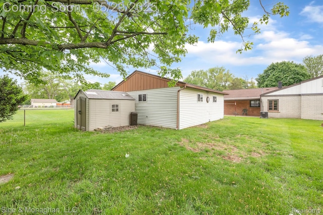 2514 Hearthside Dr, Ypsilanti, MI 48198 - back of house featuring board and batten siding
