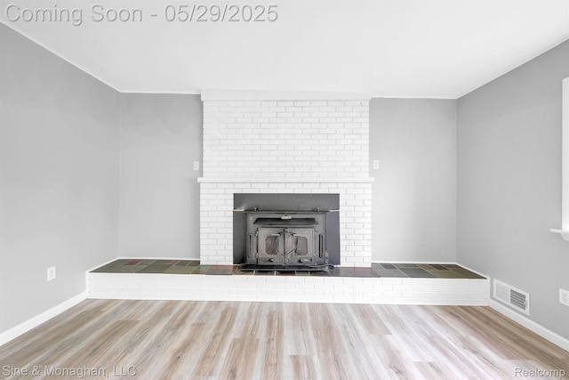 2514 Hearthside Dr, Ypsilanti, MI 48198 - unfurnished living room with wood finished floors and baseboards