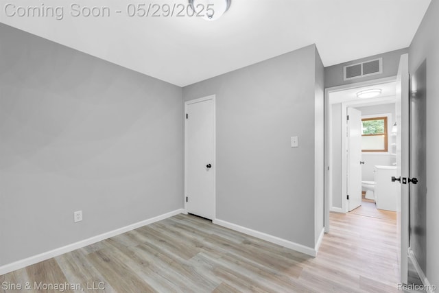 2514 Hearthside Dr, Ypsilanti, MI 48198 - unfurnished room featuring wood finished floors and baseboards