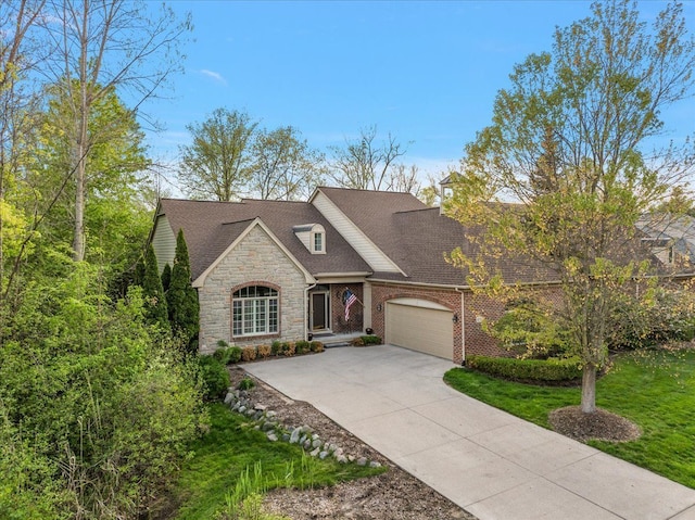 4735 Oakhurst Ridge Rd, Clarkston, MI 48348 - view of front of home with stone siding, a garage, driveway, a shingled roof, and a front yard