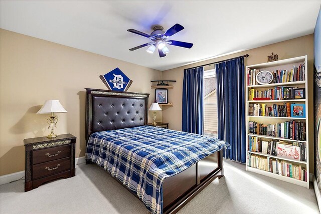 4735 Oakhurst Ridge Rd, Clarkston, MI 48348 - carpeted bedroom with baseboards and a ceiling fan
