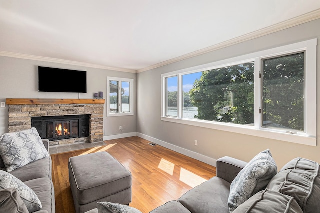 926 Brighton Lake Rd, Brighton, MI 48116 - living area with baseboards, ornamental molding, a fireplace, and wood finished floors