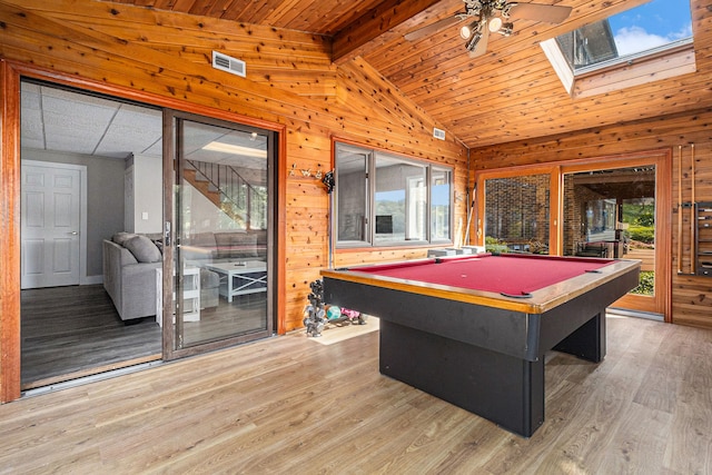 926 Brighton Lake Rd, Brighton, MI 48116 - recreation room with light wood-style flooring, pool table, wooden walls, ceiling fan, and a skylight