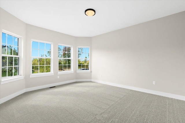 2080 Crested Butte Dr, White Lake, MI 48383 - empty room featuring carpet flooring and baseboards