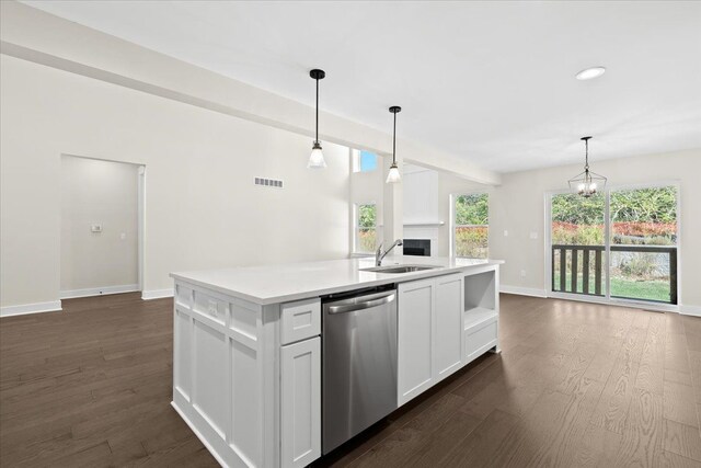 2080 Crested Butte Dr, White Lake, MI 48383 - kitchen featuring dishwasher, a sink, baseboards, dark wood-type flooring, and healthy amount of natural light