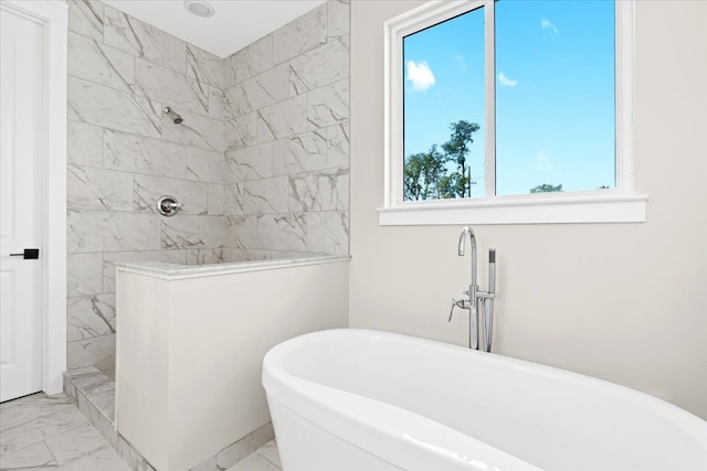 2080 Crested Butte Dr, White Lake, MI 48383 - bathroom featuring marble look tiles, walk in shower, and a freestanding bath