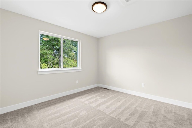 2080 Crested Butte Dr, White Lake, MI 48383 - empty room featuring light colored carpet and baseboards