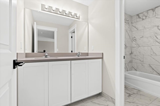 2080 Crested Butte Dr, White Lake, MI 48383 - bathroom featuring marble look tile flooring, double vanity, baseboards, and bathing tub / shower combination